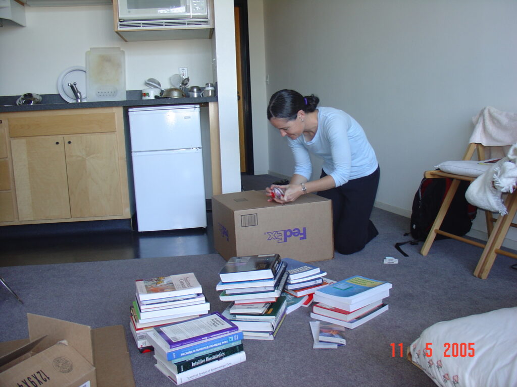 Maureen Morgan packing and labelling Dr. Shriprakash Kalantri’s books and belongings in his studio apartment, Berkeley, California, before his return to Sevagram, May 2005