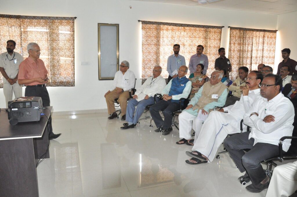 Dr. S.P. Kalantri presenting the history of MGIMS to Vice-President M. Venkaiah Naidu at the inauguration of the new operating theatre complex, Sevagram, 27 February 2018. Mr. Naidu had asked him to cut his presentation to seven minutes.