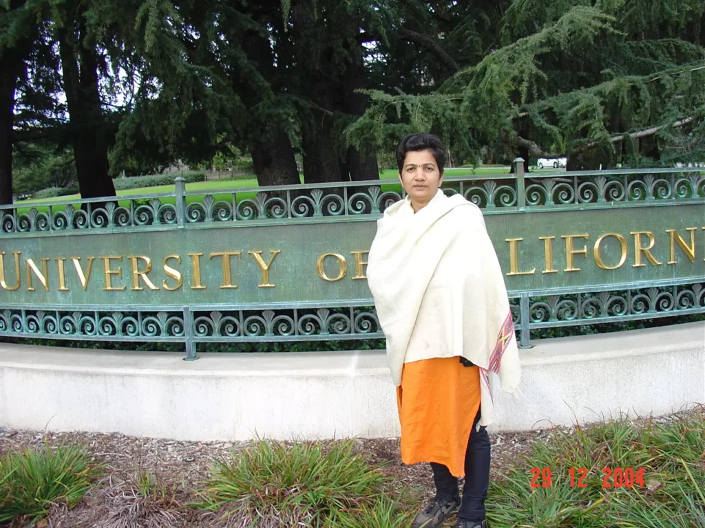 Bhavana Kalantri at the University of California Berkeley campus entrance sign, Berkeley, California, 28 December 2004, during a visit to SP Kalantri during his Fogarty-funded MPH year.
