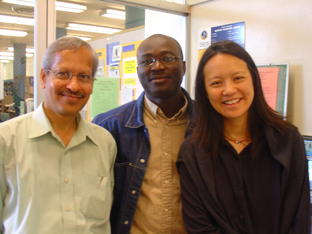 SP Kalantri, Joseph, and Christine Ho at the UC Berkeley Public Health Library, Berkeley, California, 2004.