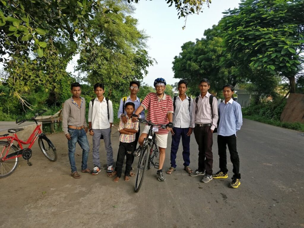 SP Kalantri with a group of young villagers who asked to be photographed together during a cycling ride near Sevagram, 2017.