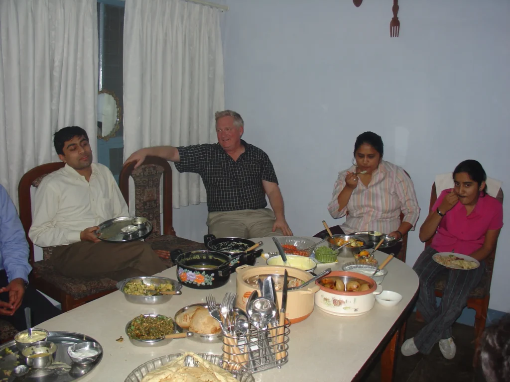 Dr Saranya Sridhar, Dr Jack Colford Jr, Dr Nikita Pant Pai, and Amrita Kalantri at dinner at the Kalantri home in Sevagram, January 2006, during the UC Berkeley epidemiology workshop