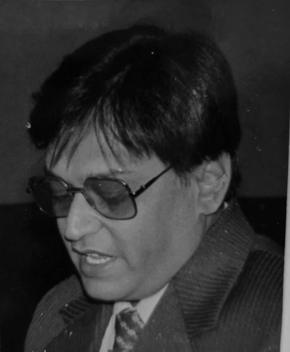 Black and white portrait picture of Dr Ashok Pakhan, dental surgeon at MGIMS Sevagram