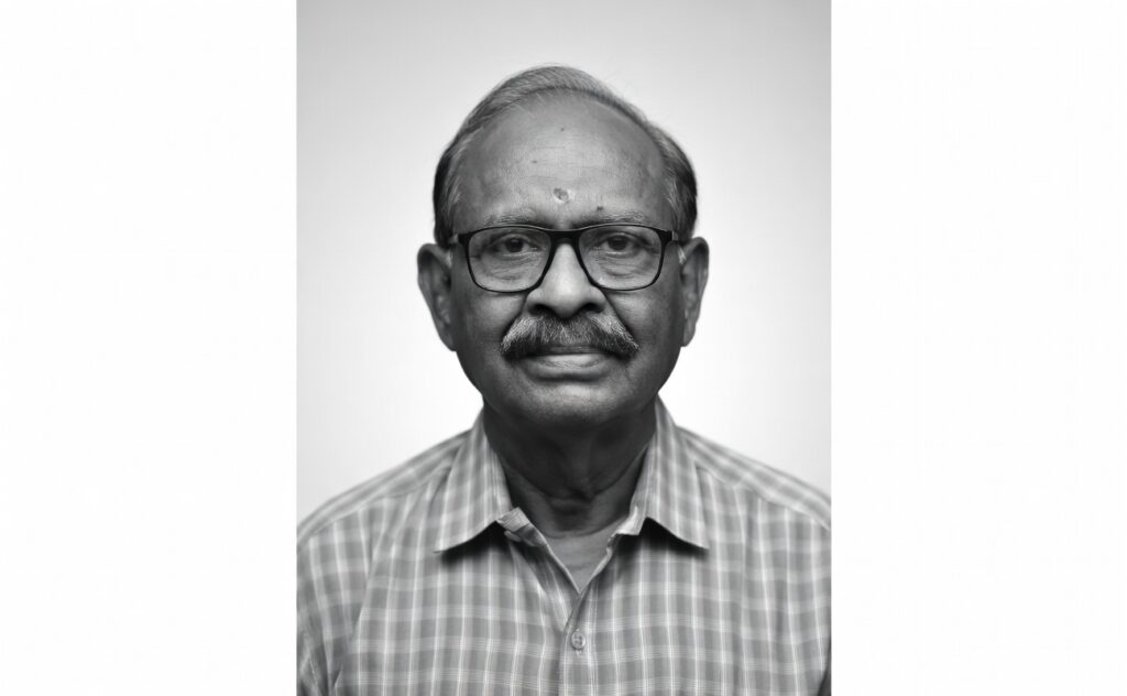 Portrait photograph of Dr. Santish Gupta, reader in Pathology at MGIMS Sevagram in the 1980s.